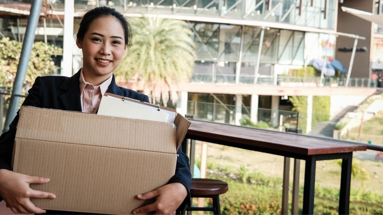 employee carrying a box